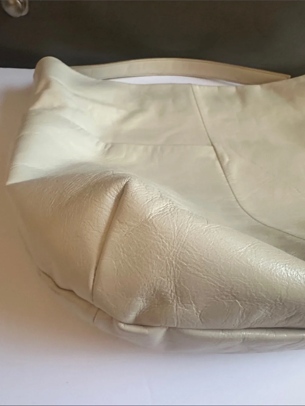 HOBO Cream Leather Hobo with Tassel Accent